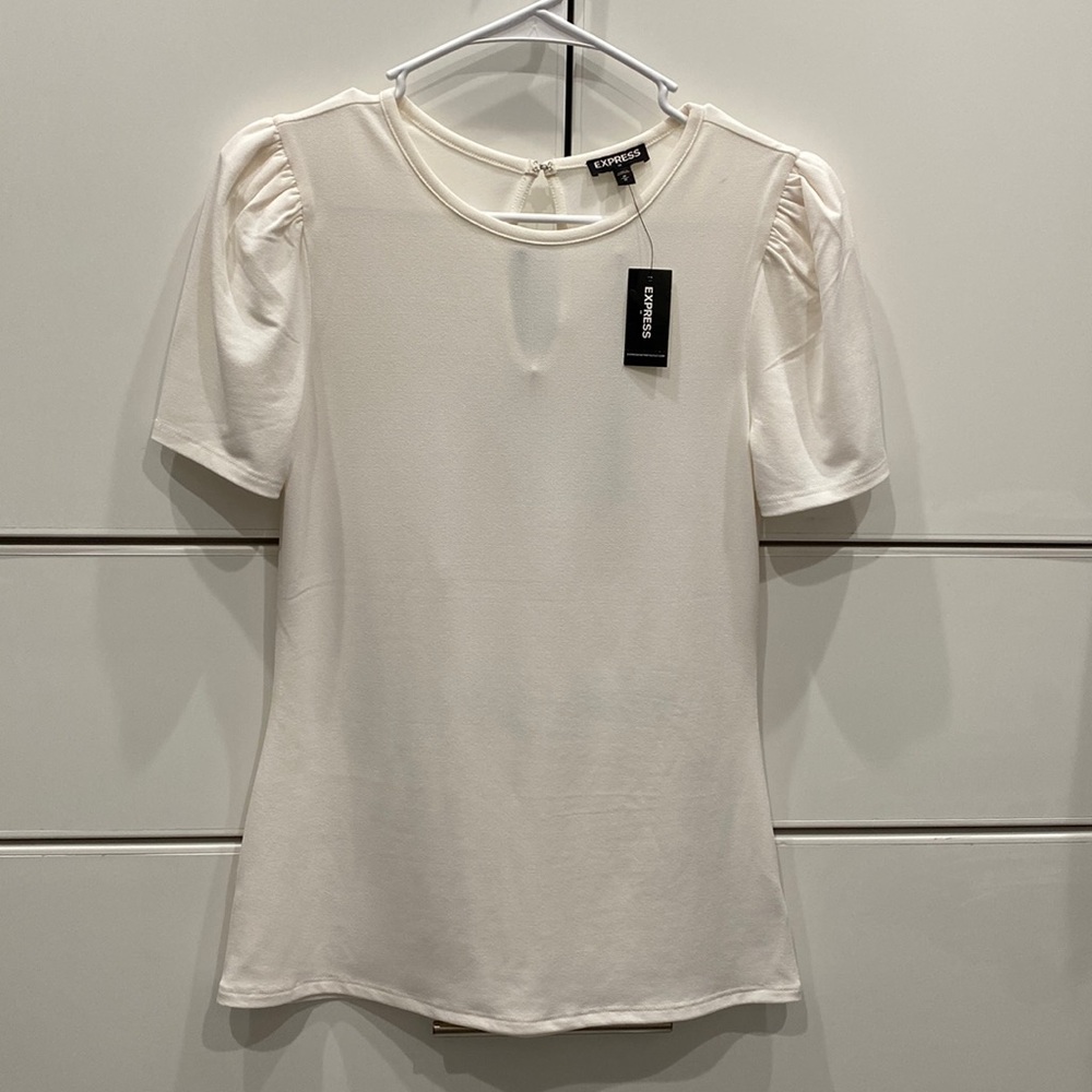 Womens top. Size medium. Off white